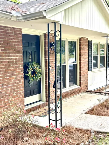 a view of a entryway door front of house