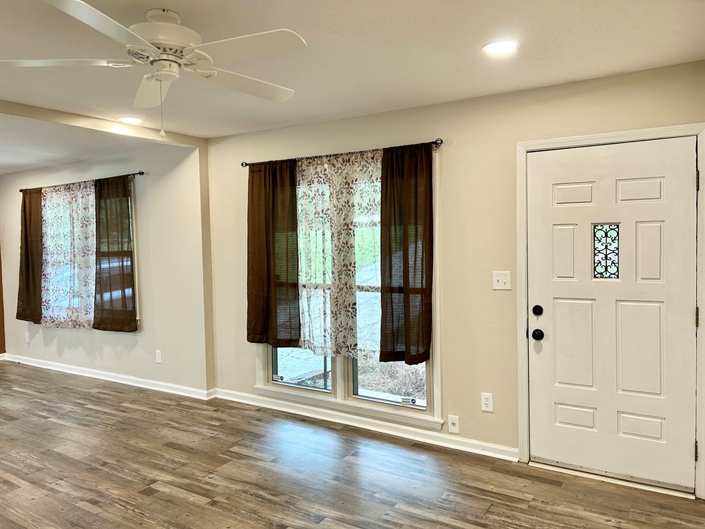 5636 Webb Avenue Columbus, GA 31909 - Photo 8 of 52 an empty room with wooden floor and windows