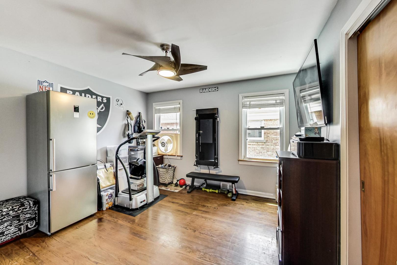 3312 Crain Street Skokie, IL 60076 - Photo 21 of 34 a view of a livingroom with furniture and a window