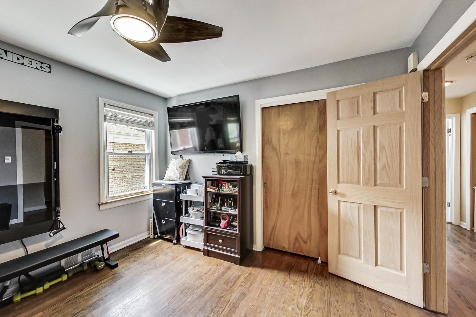 3312 Crain Street Skokie, IL 60076 - Photo 22 of 34 a view of a livingroom with furniture and a window