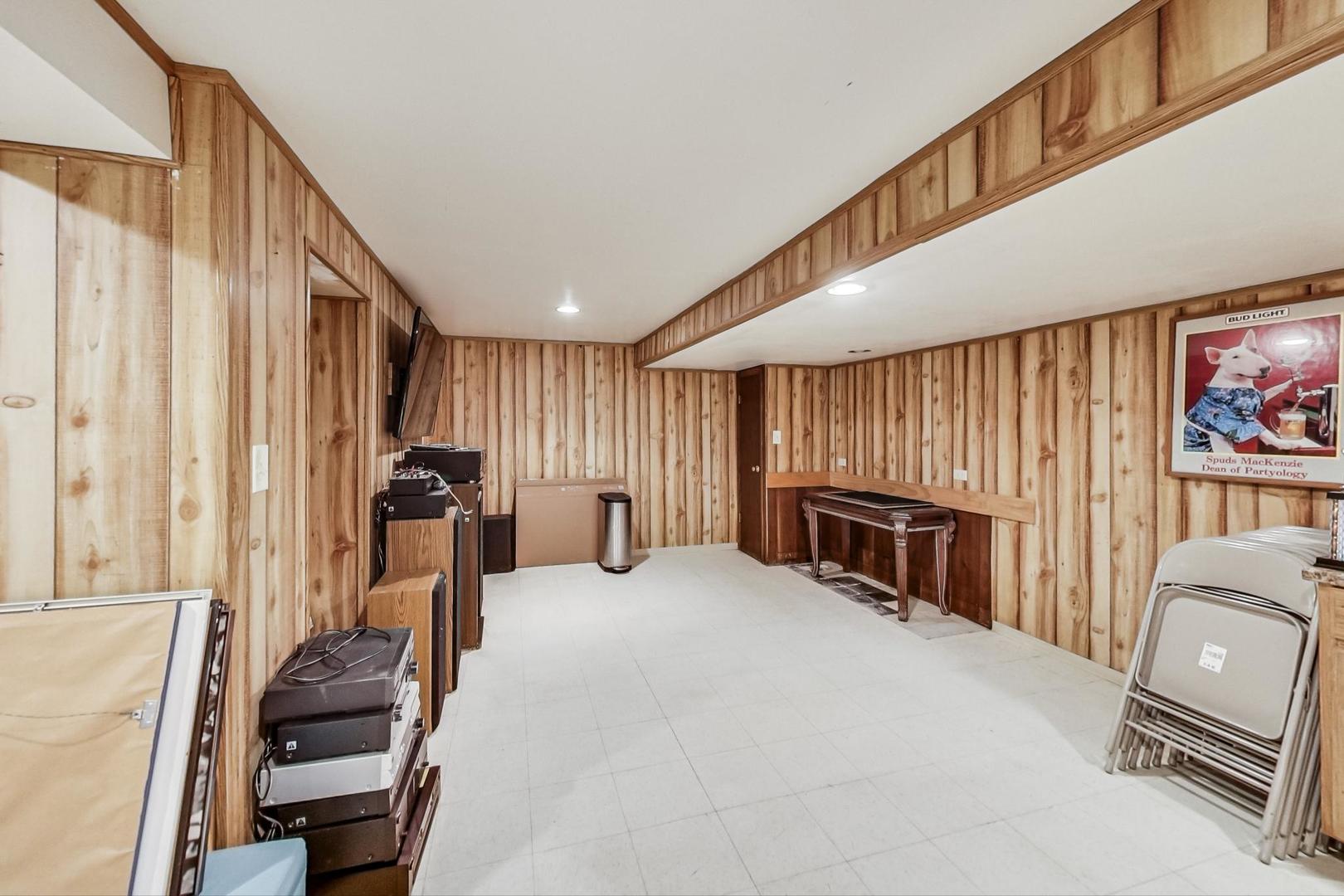 3312 Crain Street Skokie, IL 60076 - Photo 25 of 34 a view of a livingroom with furniture and a fireplace