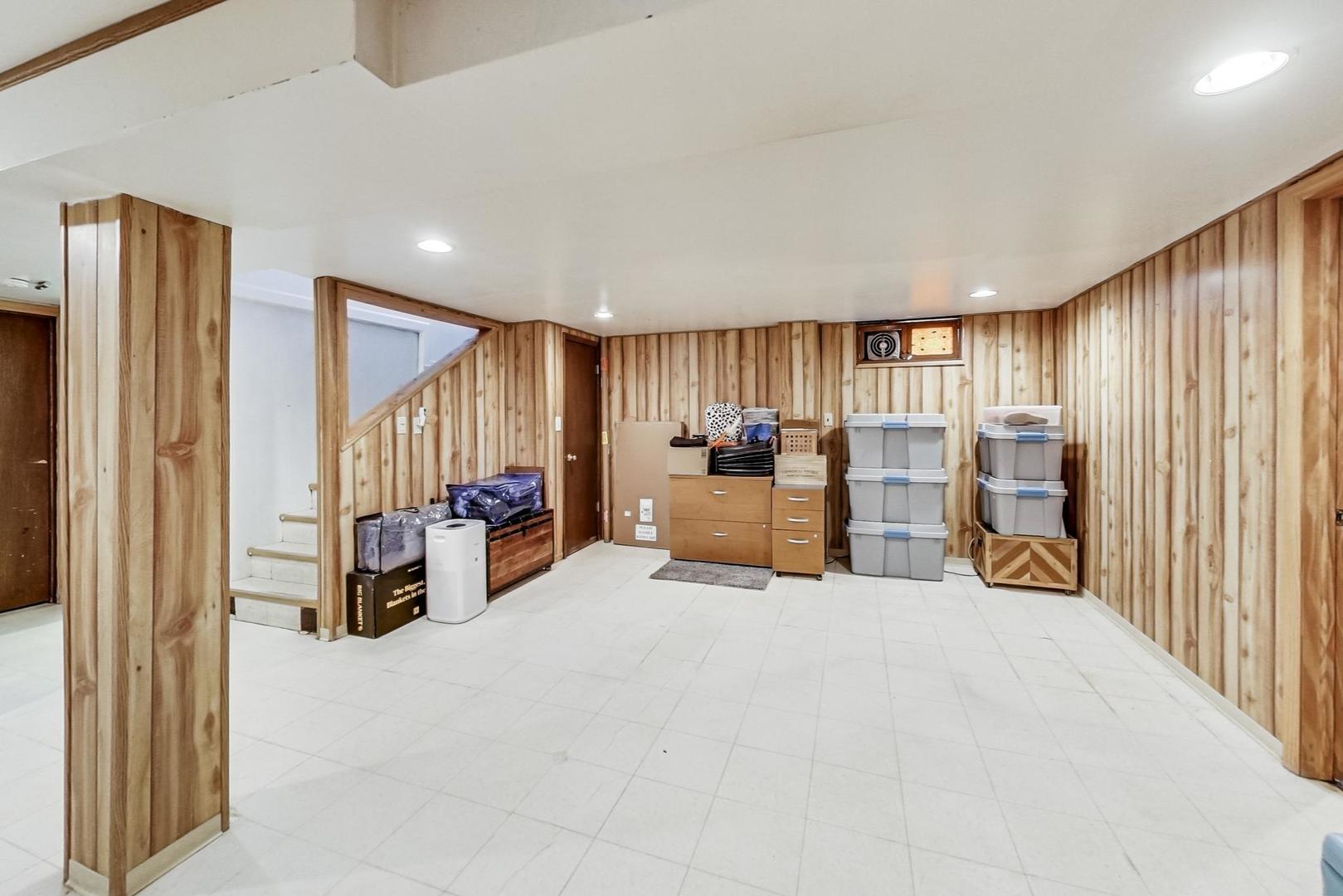 3312 Crain Street Skokie, IL 60076 - Photo 26 of 34 a view of a livingroom with furniture and a window