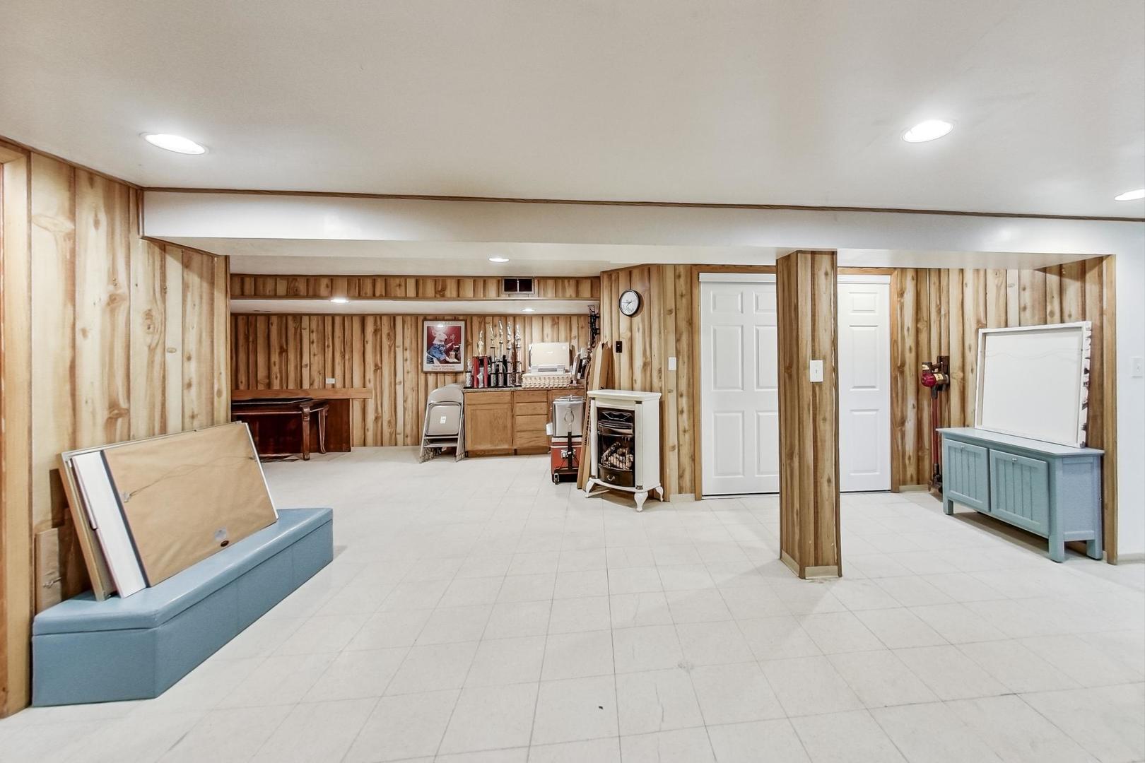 3312 Crain Street Skokie, IL 60076 - Photo 27 of 34 a living room with furniture and large window