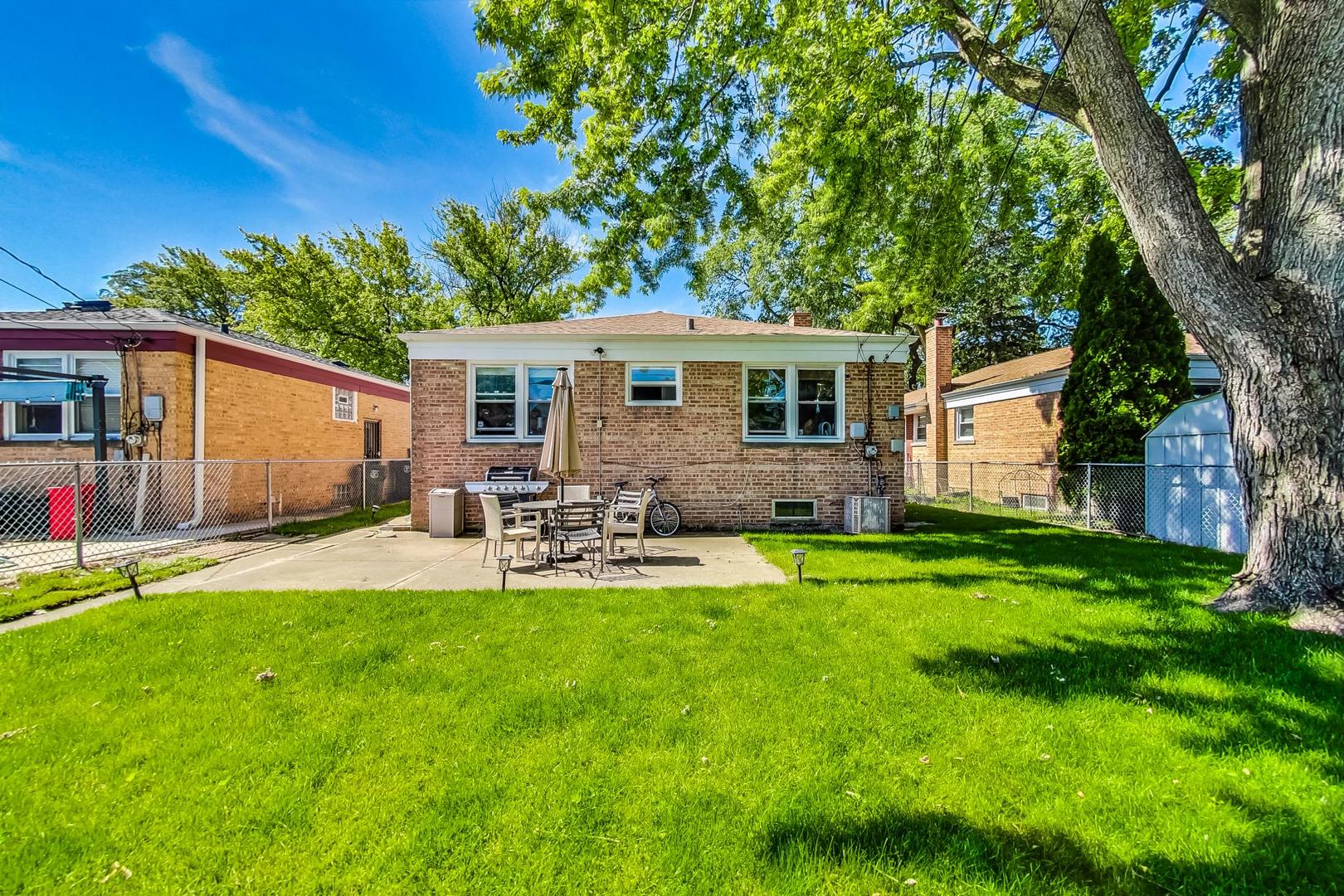 3312 Crain Street Skokie, IL 60076 - Photo 34 of 34 a view of a house with backyard and sitting area