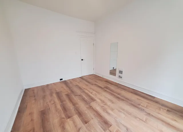 a view of a room with an empty space