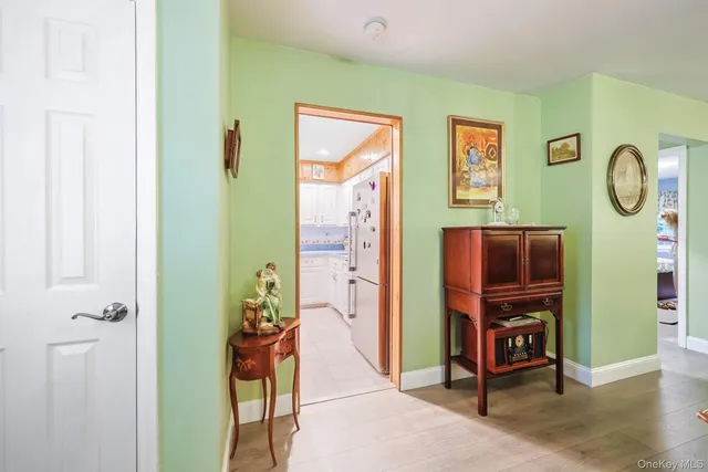 a view of a study room with workspace