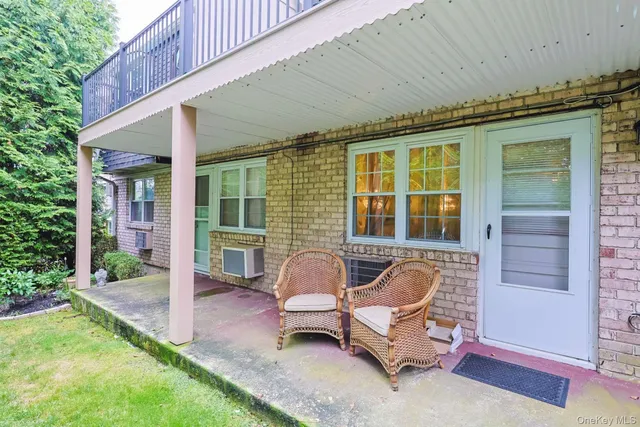 a building outdoor space with patio furniture