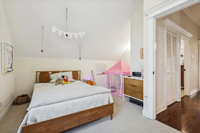 a bedroom with a bed and a cabinets