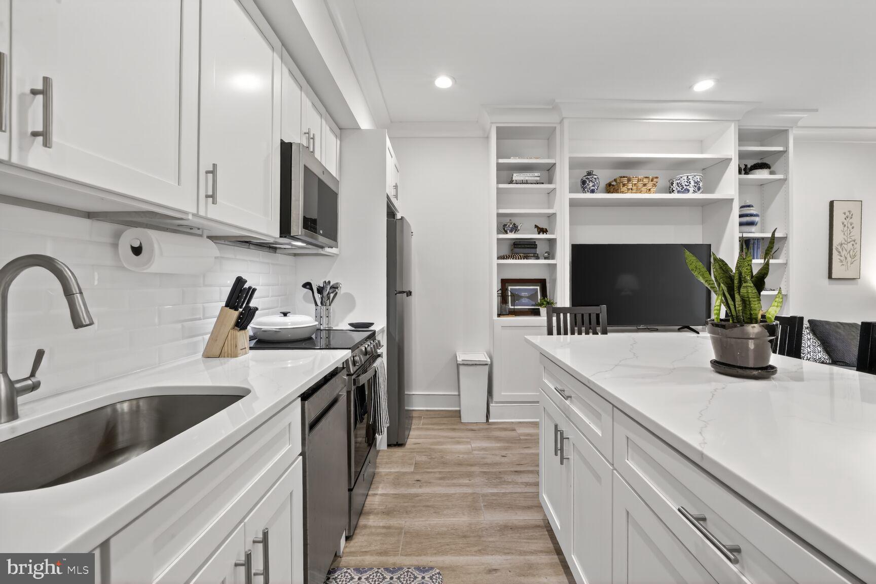 1232 I Street Northeast, Unit 1 Washington, DC 20002 - Photo 14 of 59 Modern kitchen with sleek finishes.