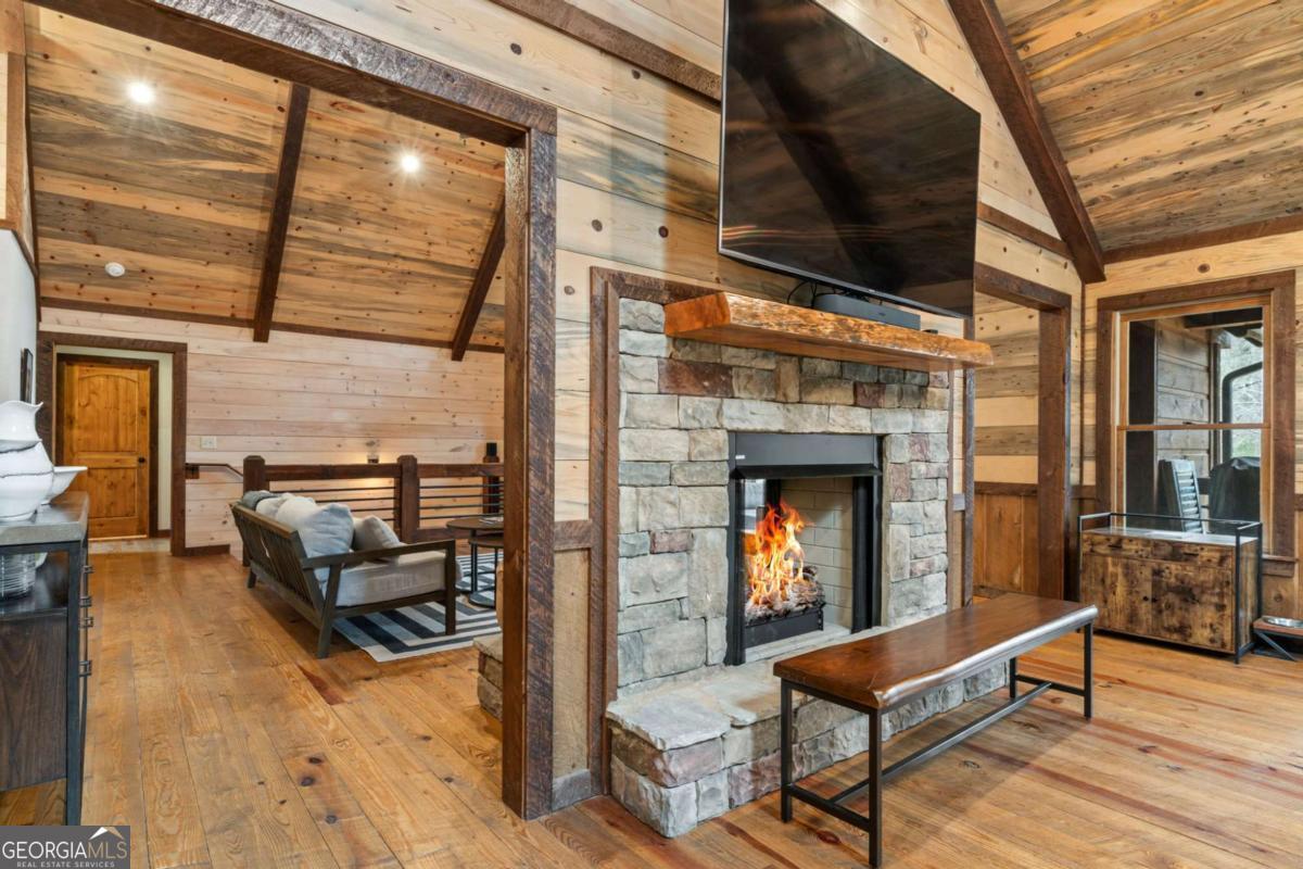 15 Bootleg Mountain Road, Unit 11 Morganton, GA 30560 - Photo 12 of 67 a view of a livingroom with furniture and a fireplace