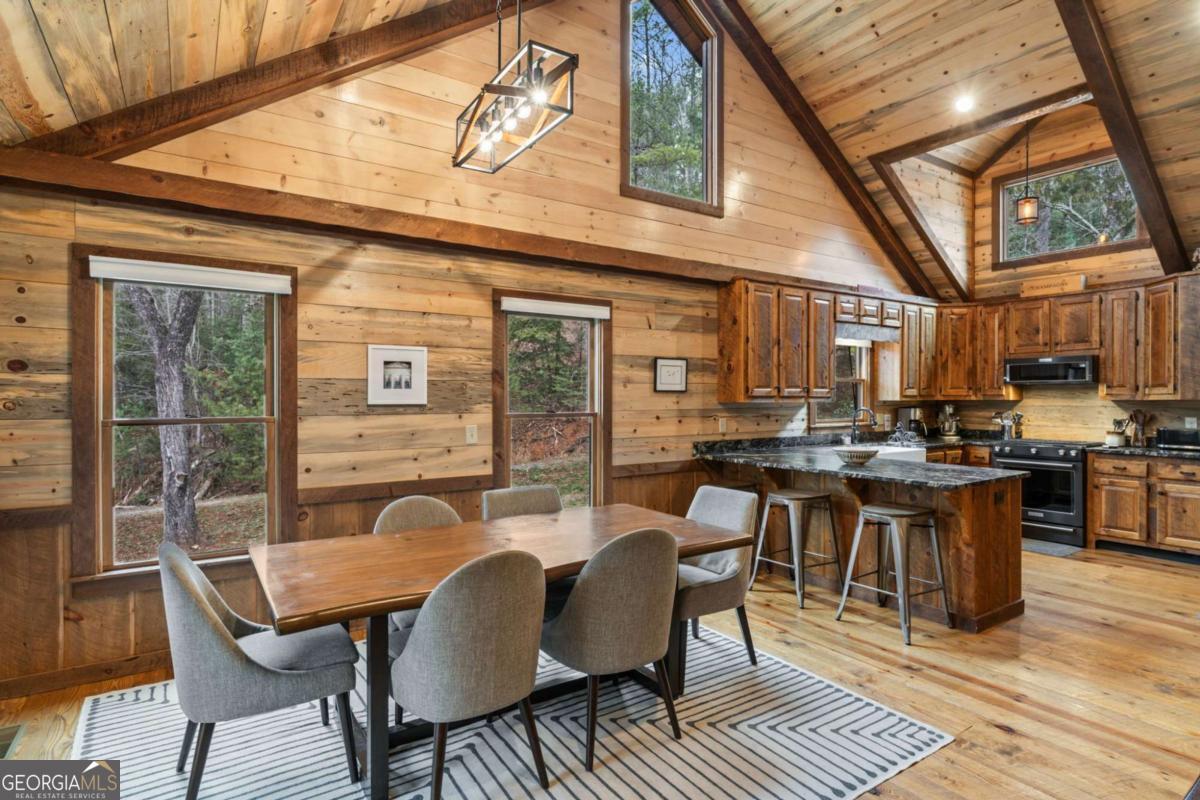 15 Bootleg Mountain Road, Unit 11 Morganton, GA 30560 - Photo 14 of 67 a dining room with furniture a rug and wooden floor