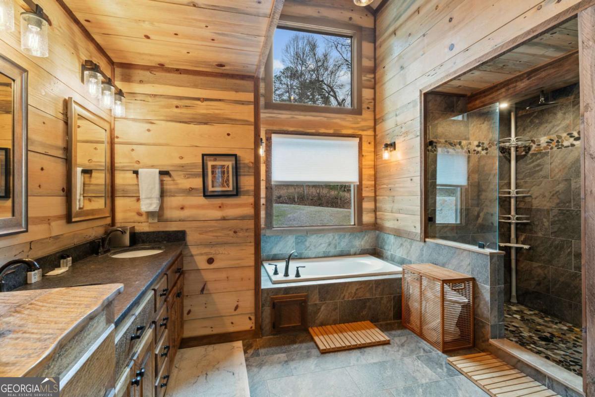 15 Bootleg Mountain Road, Unit 11 Morganton, GA 30560 - Photo 30 of 67 a bathroom with a sink a toilet and shower