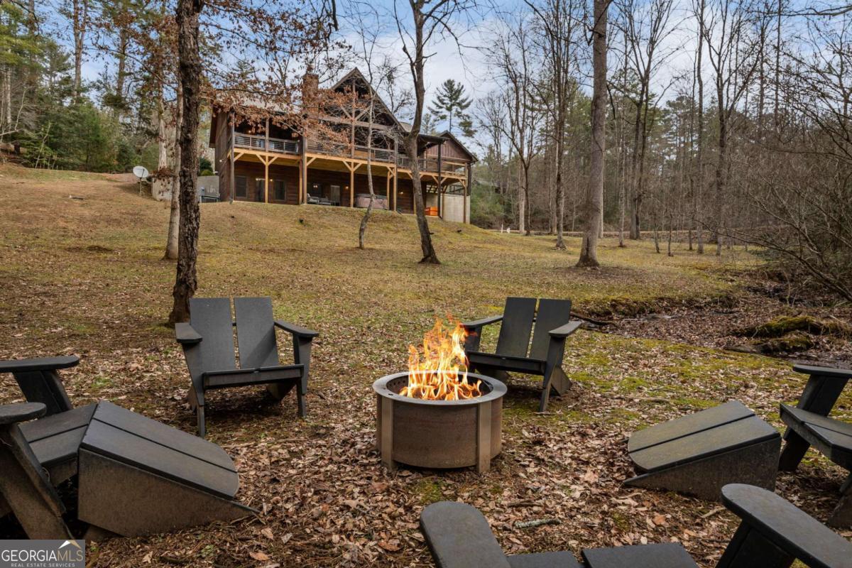 15 Bootleg Mountain Road, Unit 11 Morganton, GA 30560 - Photo 56 of 67 a front view of a house with a yard