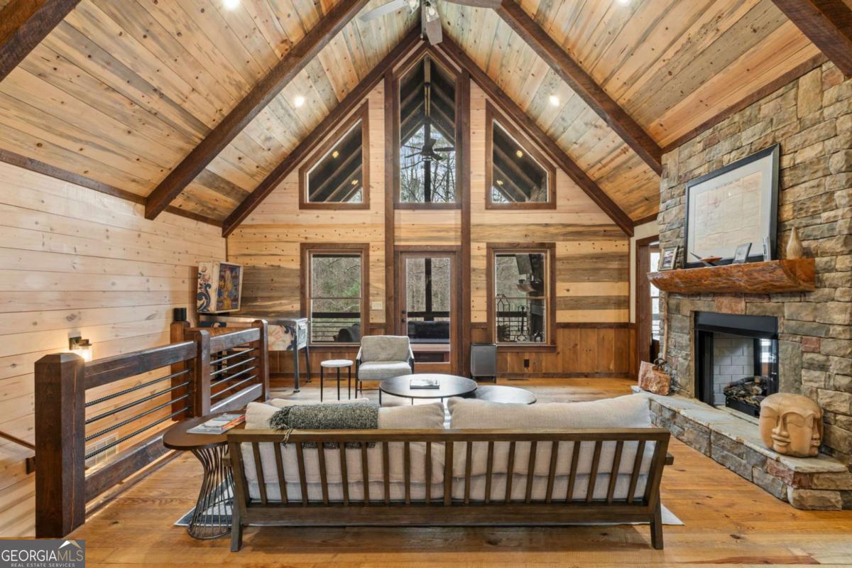 15 Bootleg Mountain Road, Unit 11 Morganton, GA 30560 - Photo 6 of 67 a view of a chairs and table in the patio