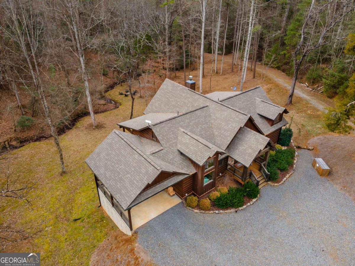 15 Bootleg Mountain Road, Unit 11 Morganton, GA 30560 - Photo 62 of 67 an aerial view of a house with a yard and potted plants