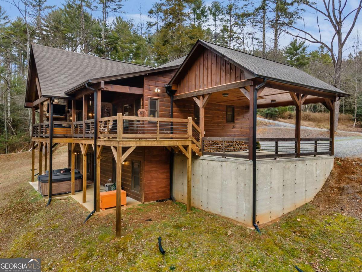 15 Bootleg Mountain Road, Unit 11 Morganton, GA 30560 - Photo 63 of 67 a view of a house with large trees