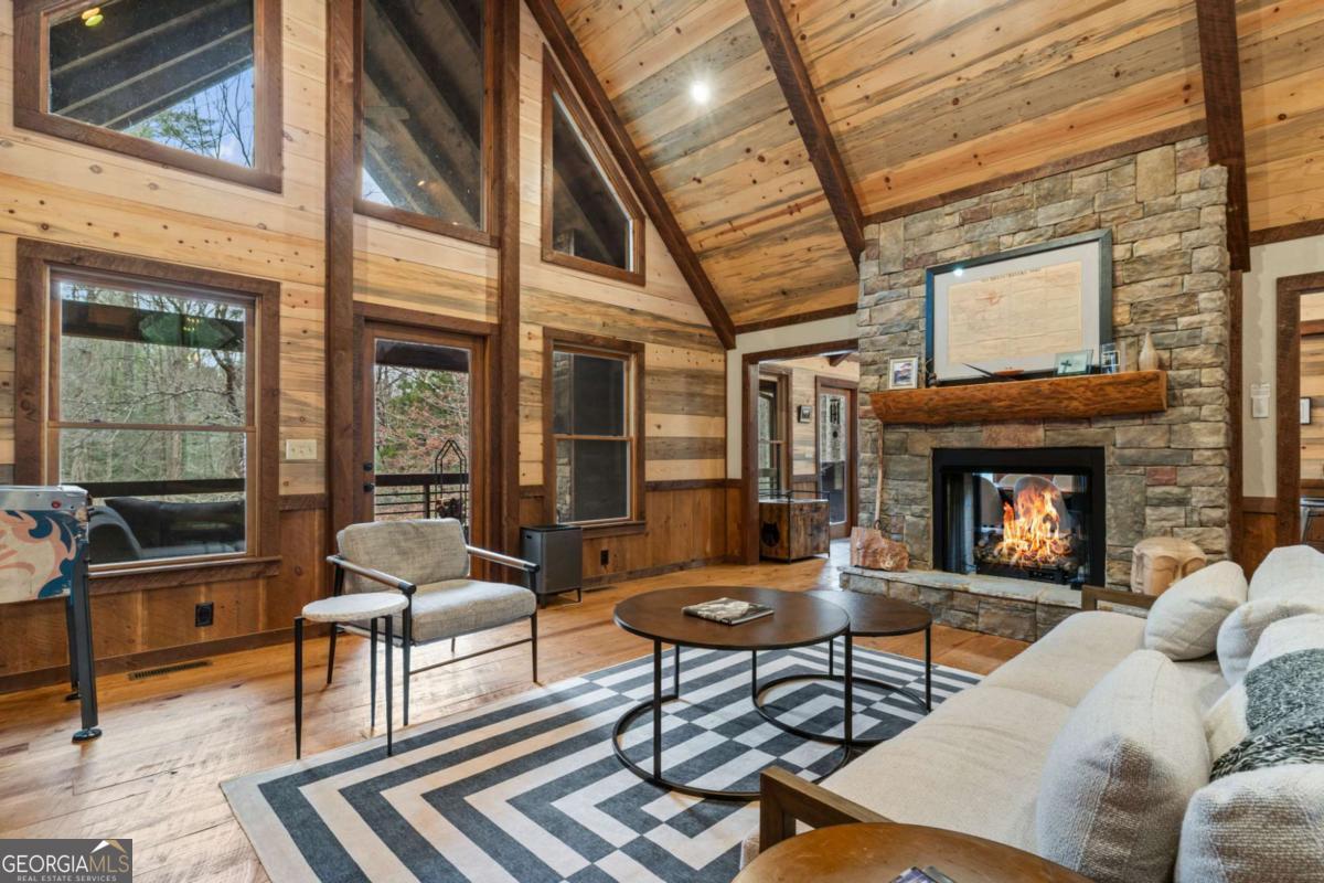 15 Bootleg Mountain Road, Unit 11 Morganton, GA 30560 - Photo 8 of 67 a living room with furniture and a fireplace