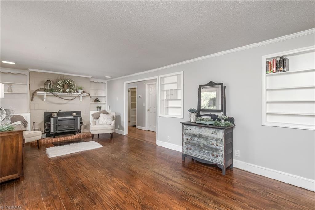 550 Pannel Road Reidsville, NC 27320 - Photo 6 of 40 Living Room w/ Wood Stove