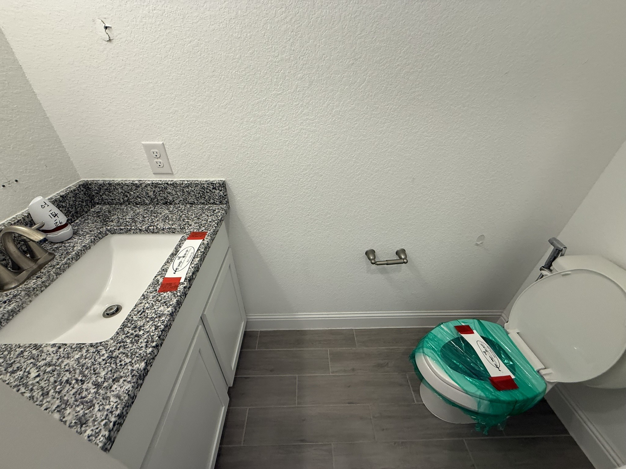7802 Wayman Pass Fulshear, TX 77441 - Photo 22 of 50 a bathroom with a sink toilet and mirror