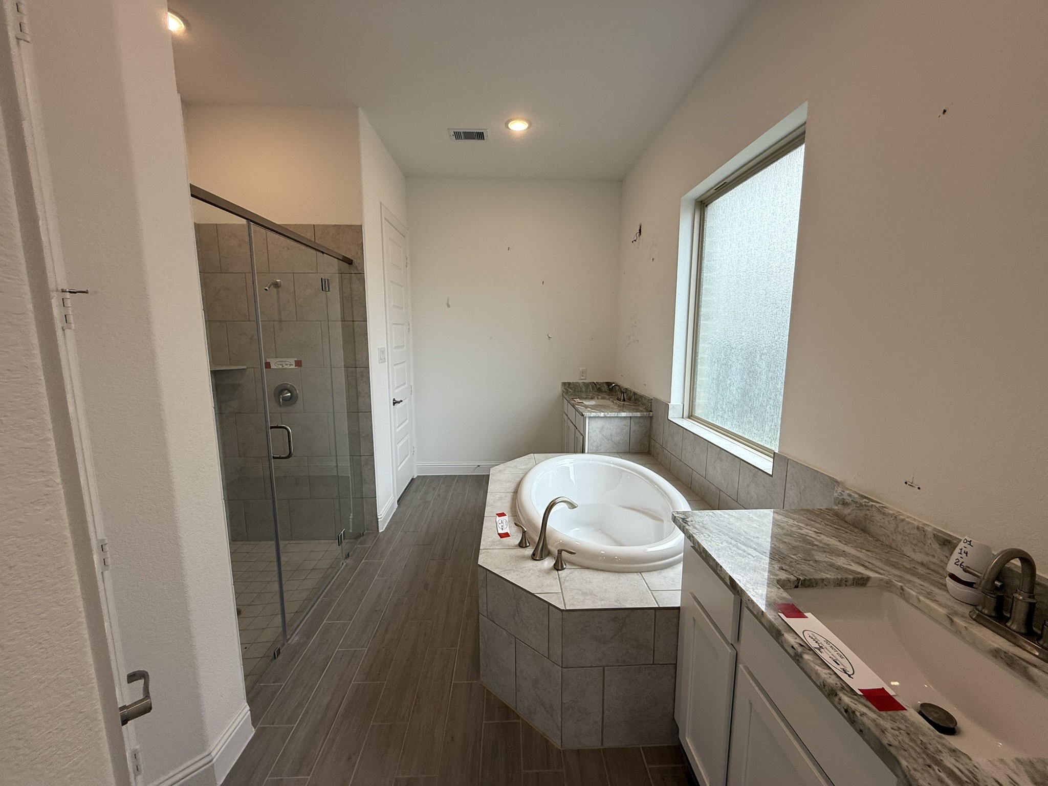 7802 Wayman Pass Fulshear, TX 77441 - Photo 29 of 50 a bathroom with a sink and a mirror