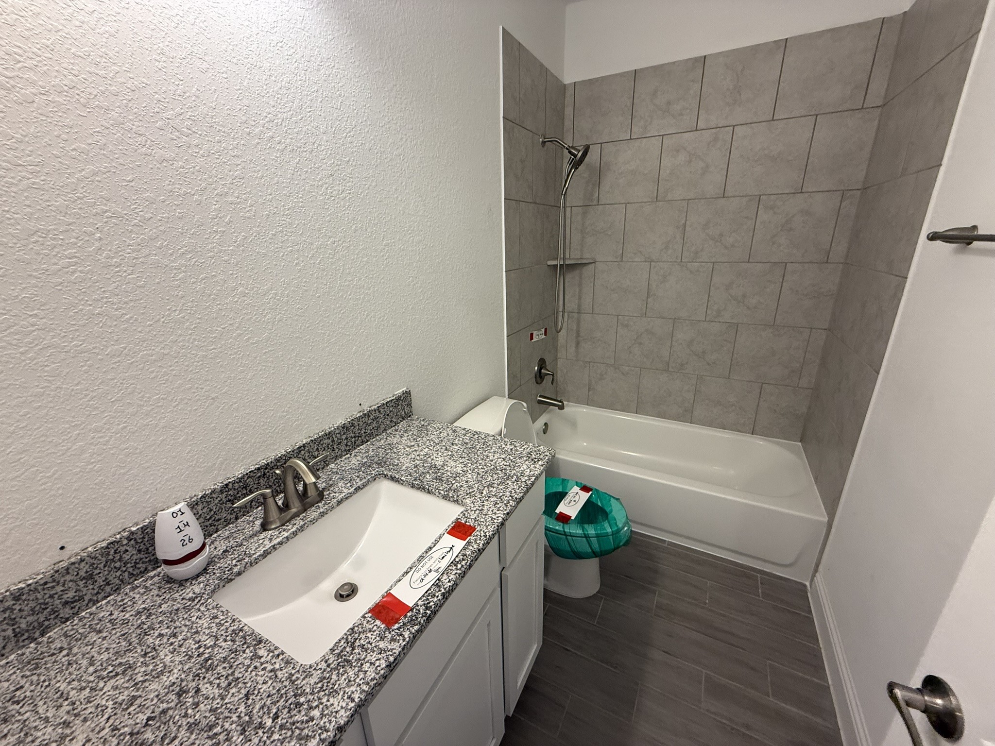 7802 Wayman Pass Fulshear, TX 77441 - Photo 40 of 50 a bathroom with a bath tub and a shower