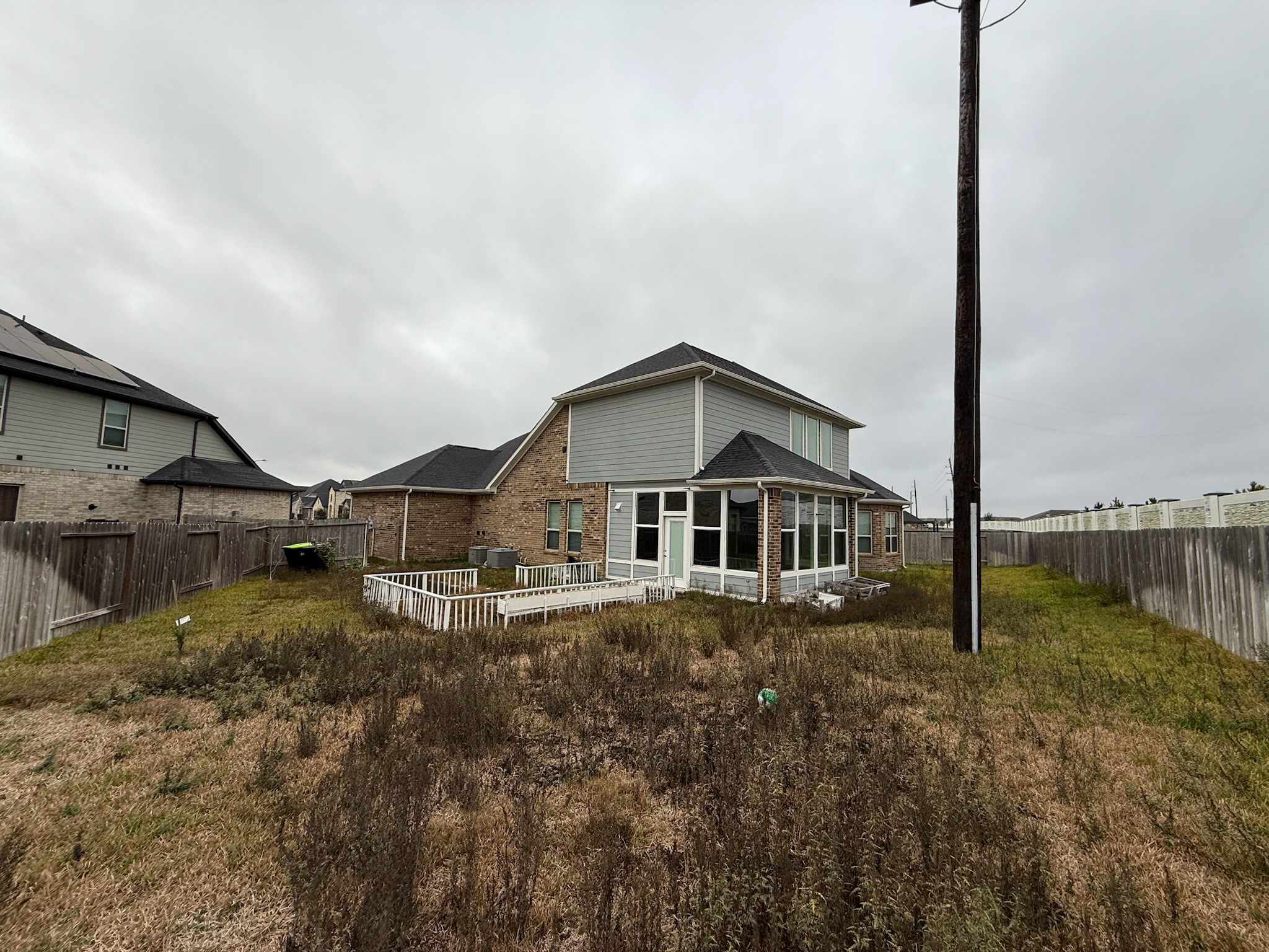 7802 Wayman Pass Fulshear, TX 77441 - Photo 50 of 50 a big house with a big yard and more windows