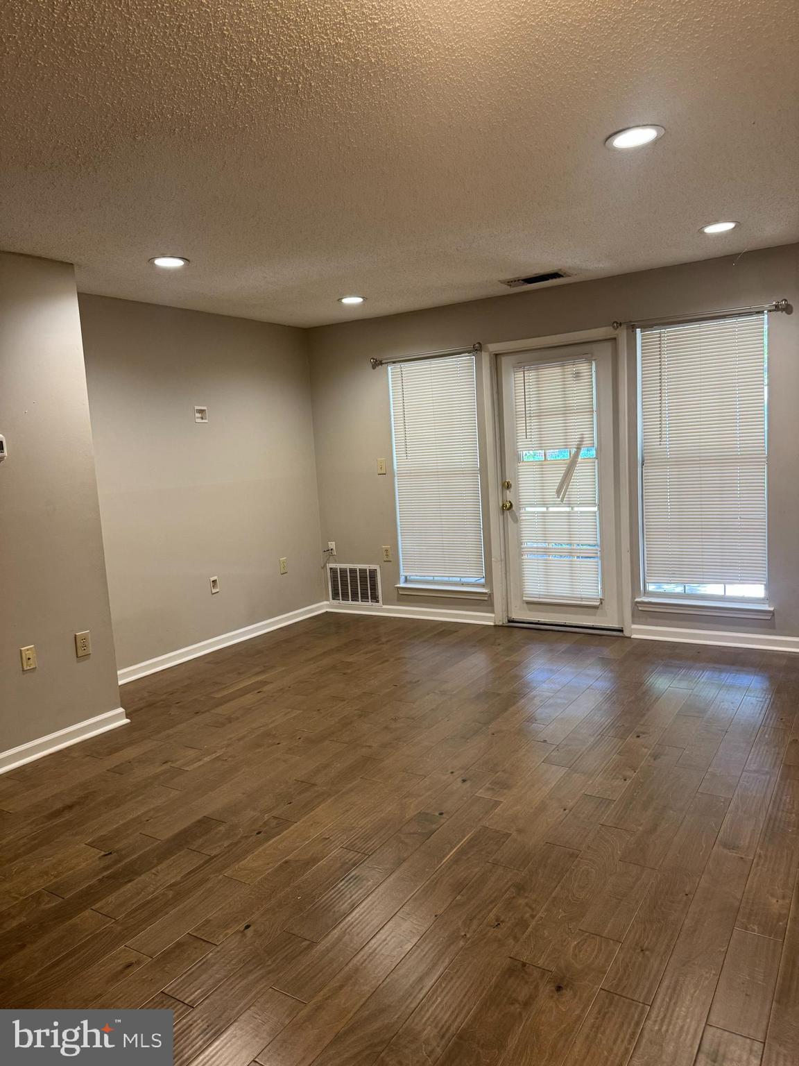21023 Timber Ridge Terrace, Unit 103 Ashburn, VA 20147 - Photo 7 of 15 living room