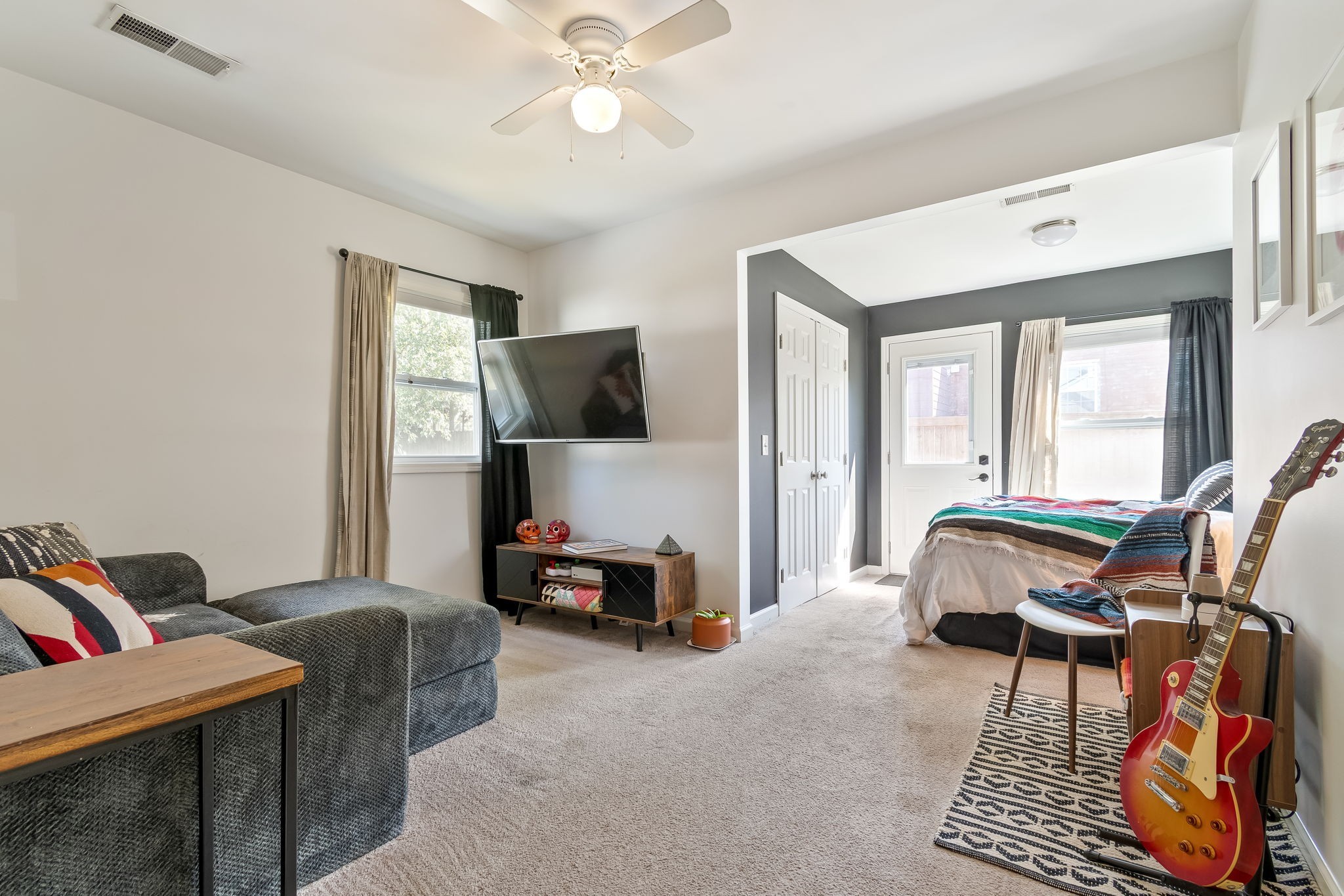 1136 Pierce Road Madison, TN 37115 - Photo 34 of 63 a living room with furniture and a flat screen tv