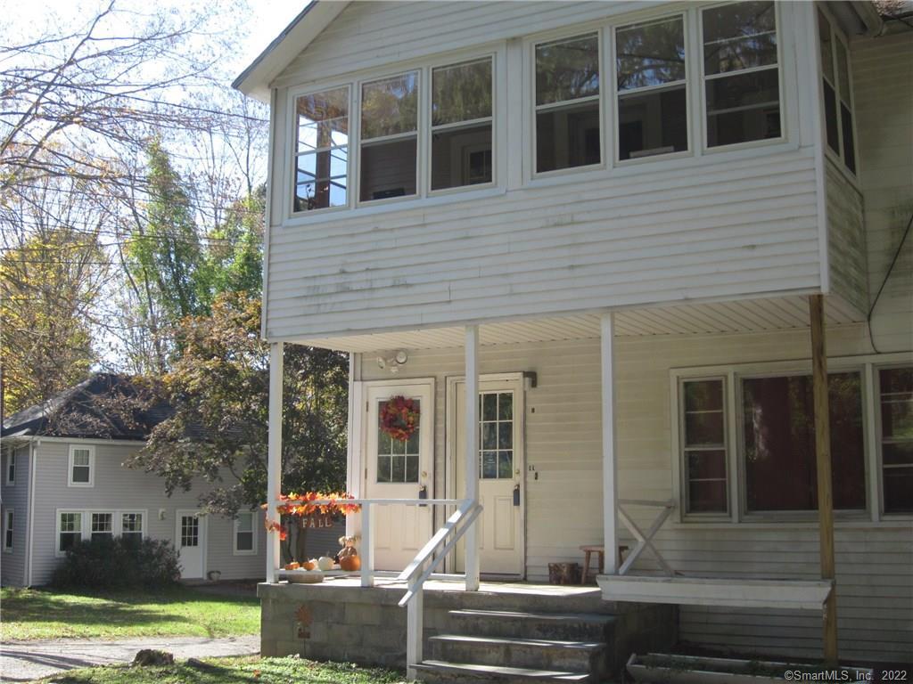 185 Redding Road Redding, CT 06896 - Photo 1 of 1 a front view of a house with garden