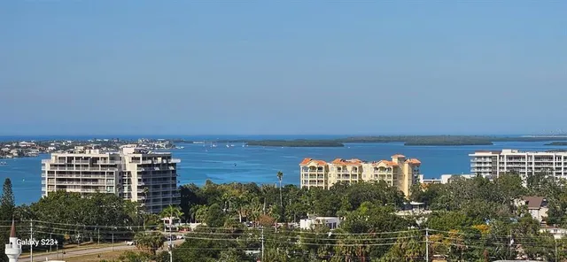 a view of a city with tall buildings