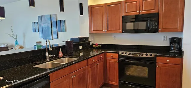 a shelf with water heater and wooden floor