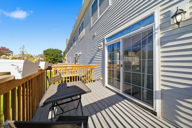 a view of a chairs on the roof deck