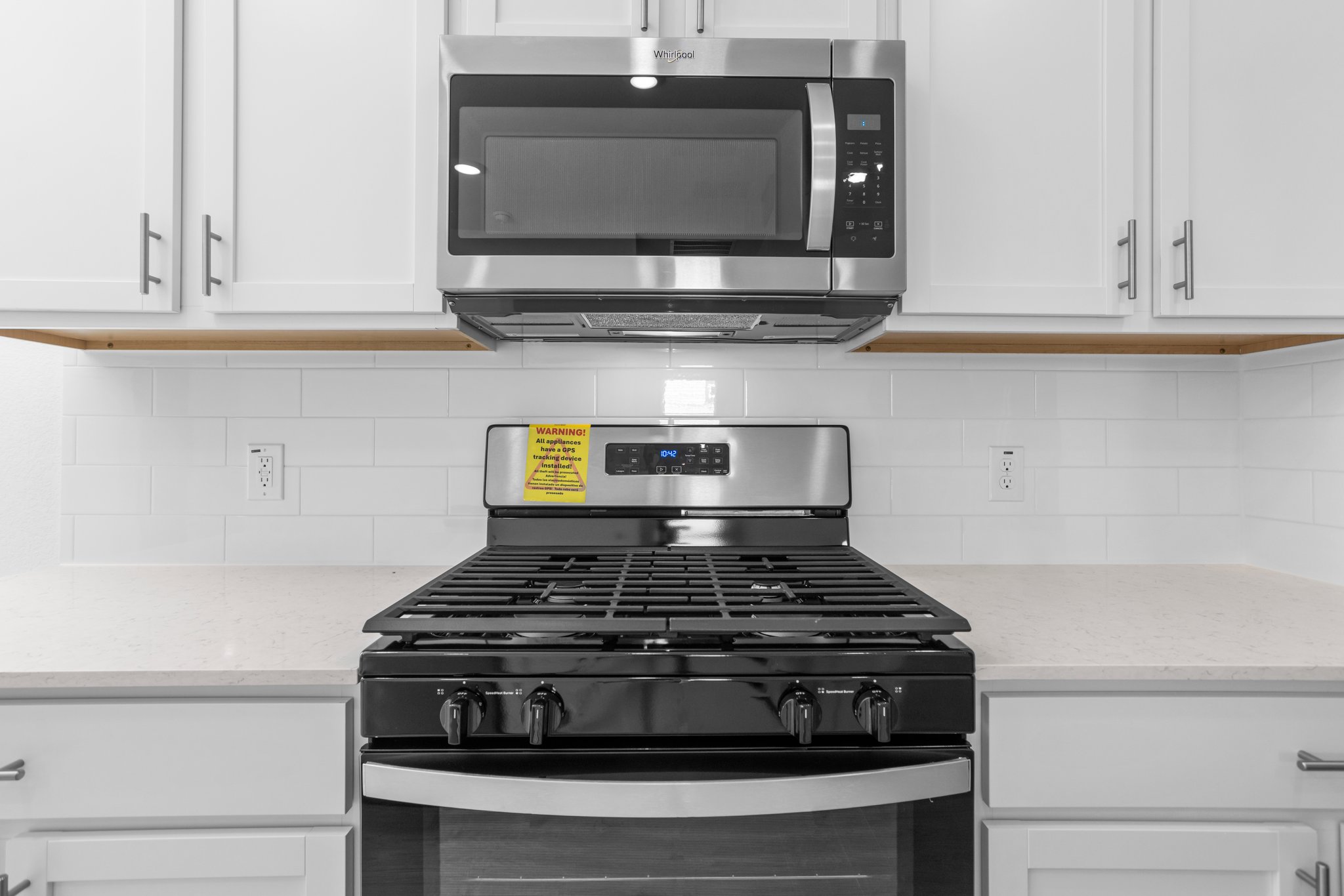305 Brooks Ranch Drive Kyle, TX 78640 - Photo 11 of 32 a stove top oven sitting inside of a kitchen