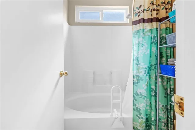 a bathroom with a bathtub