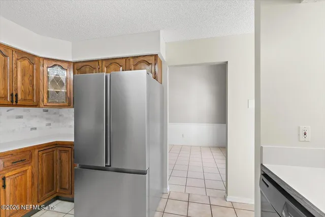 a bathroom with a shower and a sink