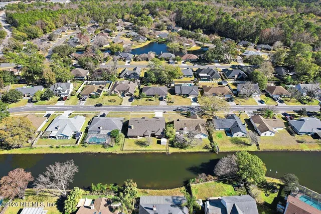 a view of swimming pool with a yard and outdoor seating