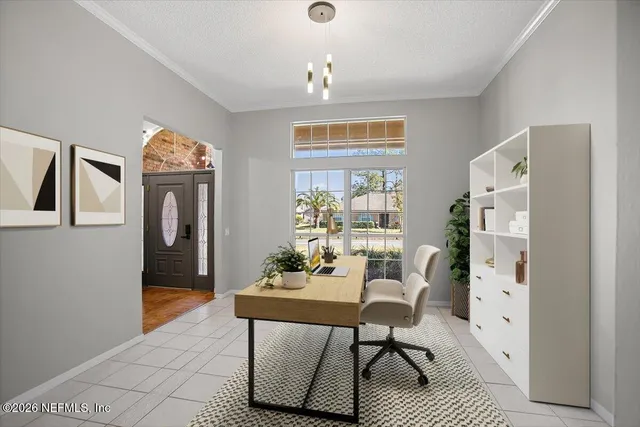 a dining room with furniture and window
