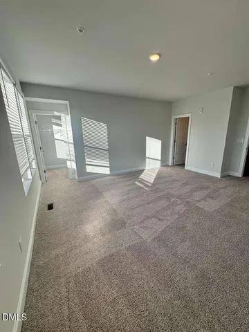 a view of a hallway and closet