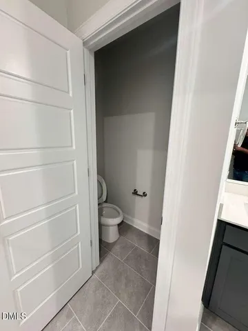 a view of a storage and utility room with a washer dryer