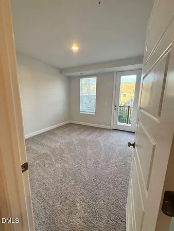 an empty room with a natural light