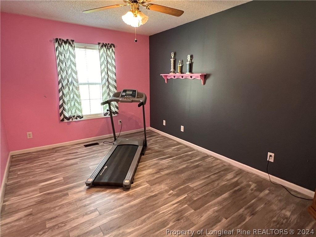 2196 Post Office Road Sanford, NC 27330 - Photo 16 of 21 a room with furniture and a window