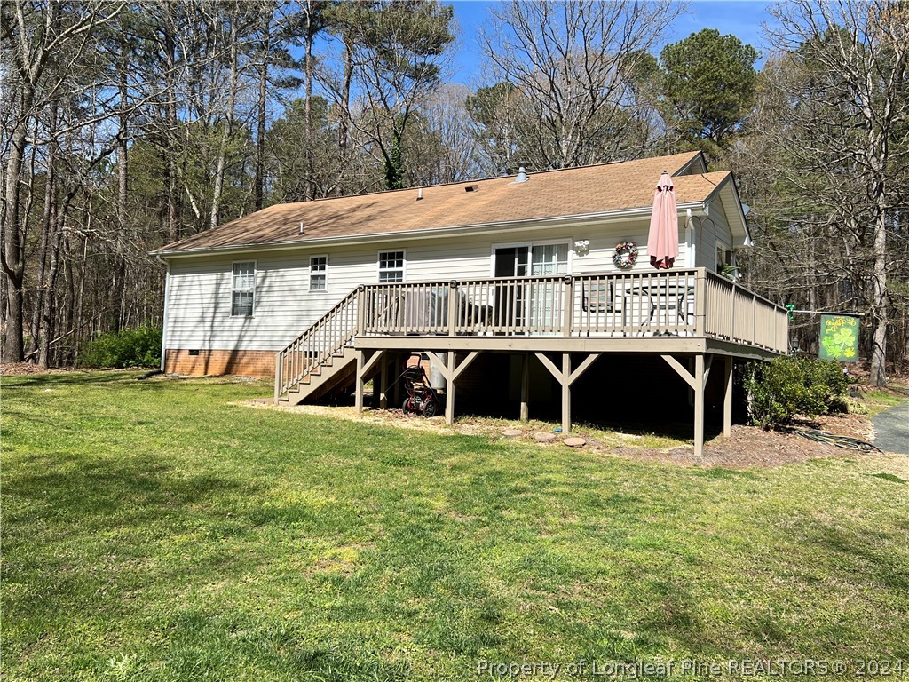 2196 Post Office Road Sanford, NC 27330 - Photo 4 of 21 a view of a house with a sink and yard