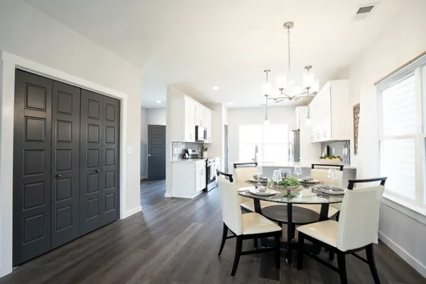 a view of a dining room and livingroom view