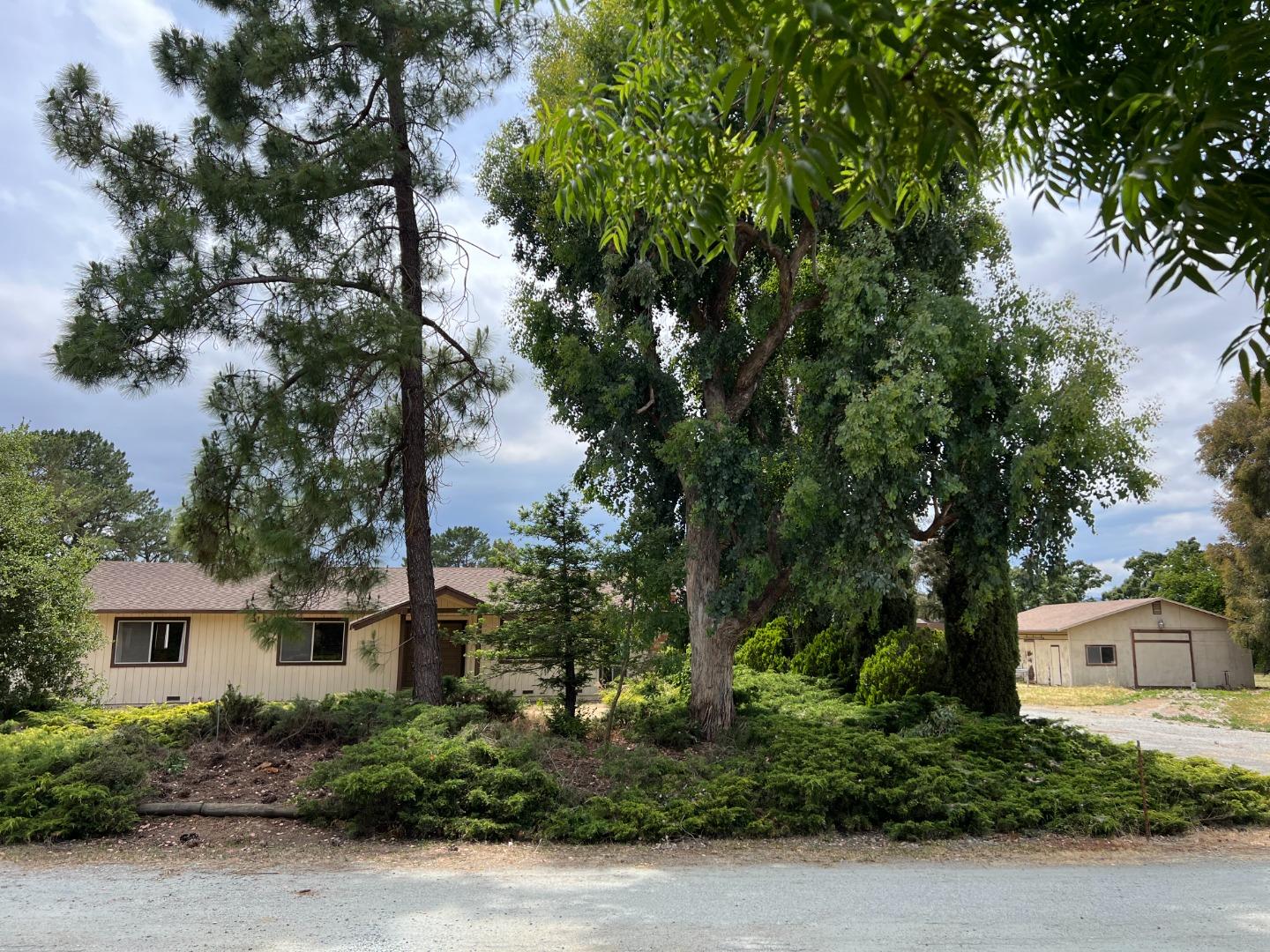 12640 Joybell Lane San Martin, CA 95046 - Photo 1 of 30 front view of a house with a tree
