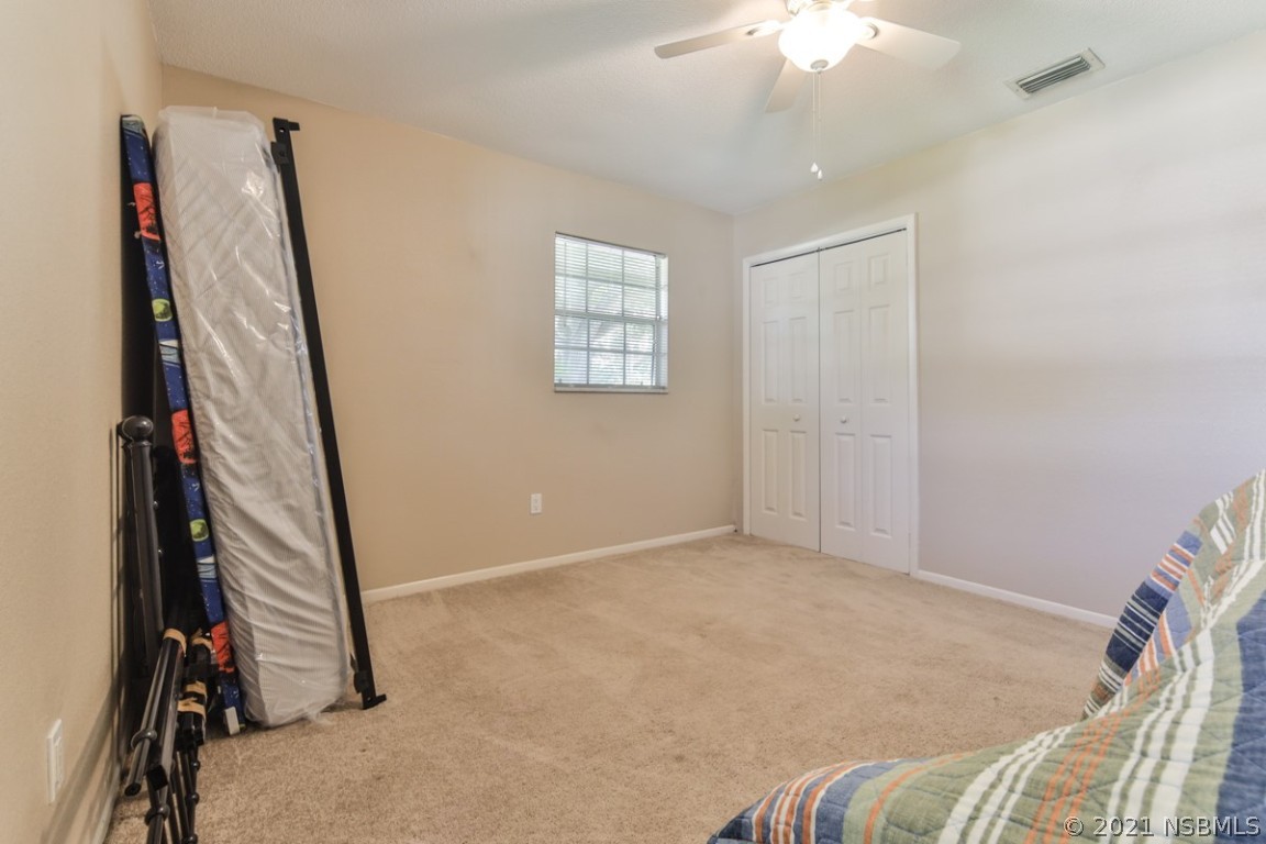 700 Green Road New Smyrna Beach, FL 32168 - Photo 27 of 37 an empty room with windows
