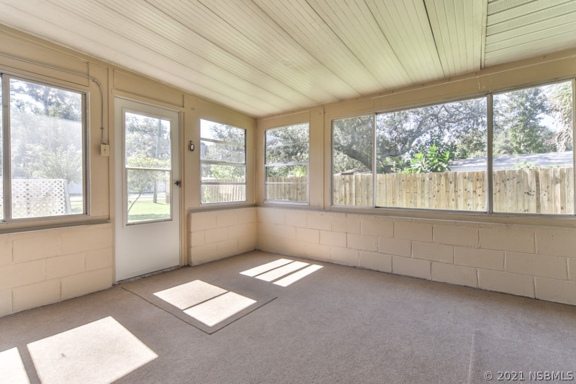 700 Green Road New Smyrna Beach, FL 32168 - Photo 31 of 37 a view of workspace with large windows