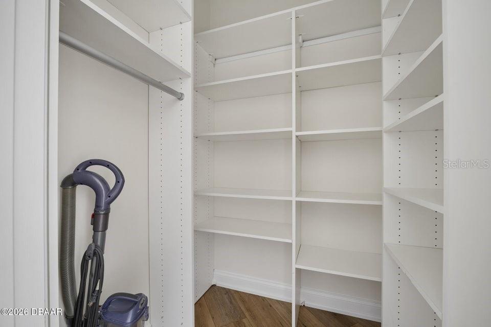 231 Riverside Drive, Unit 26011 Daytona Beach, FL 32117 - Photo 25 of 56 a close view of a walk in closet