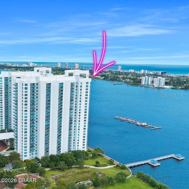 231 Riverside Drive, Unit 26011 Daytona Beach, FL 32117 - Photo 3 of 56 a view of a terrace with lawn chairs