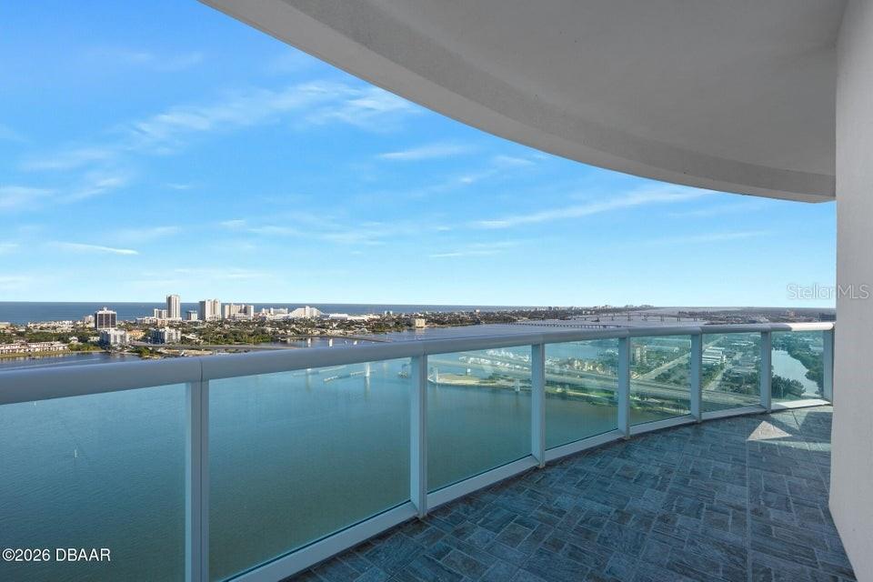 231 Riverside Drive, Unit 26011 Daytona Beach, FL 32117 - Photo 5 of 56 a view of a city skyline from a terrace