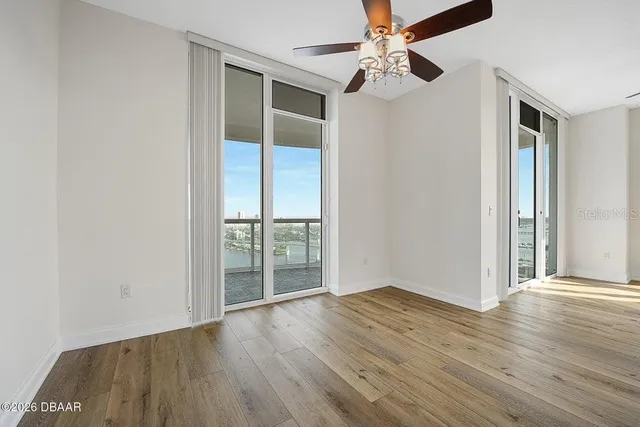 a kitchen with granite countertop a stove and a sink